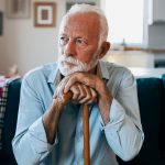 Elderly Man Sitting Alone Looking Pensive